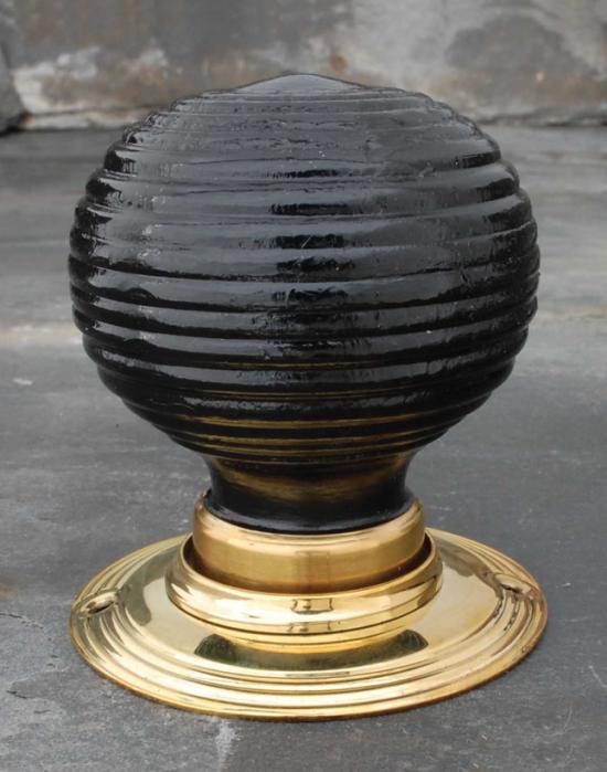 Pair of ebonised wood beehive door knobs