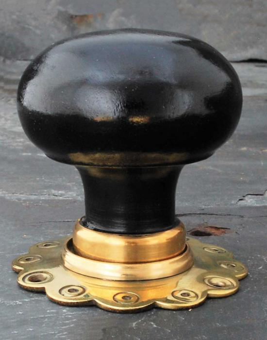 Pair of ebonised wooden bun door knobs