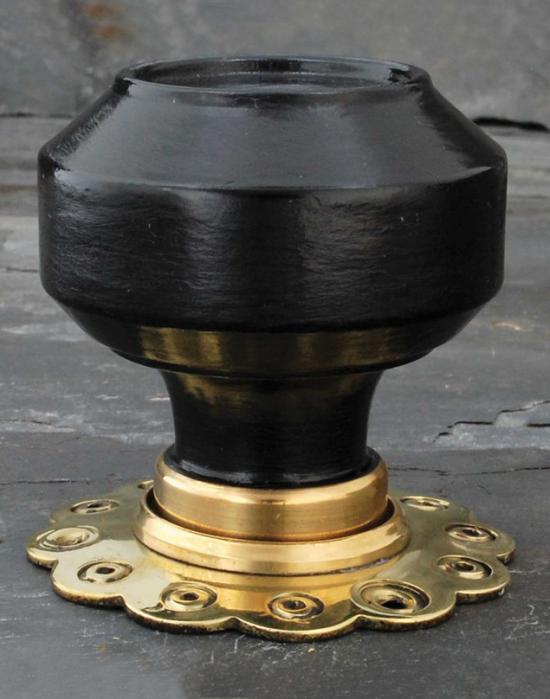 Pair of Savoy ebonised door knobs