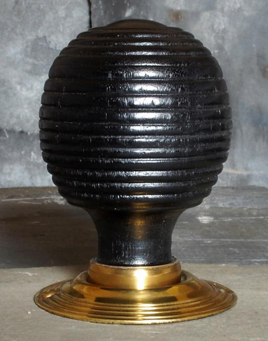 Pair of large ebonised beehive door knobs