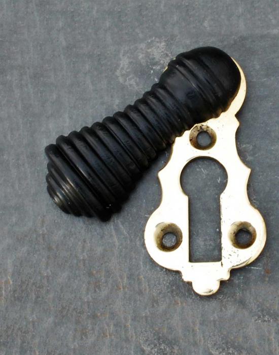 Ebonised wood beehive escutcheon