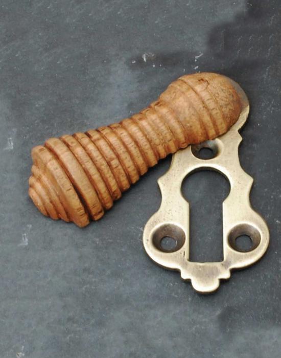 Natural wood beehive escutcheon