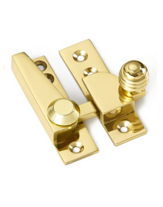 Reeded knob sash fastener