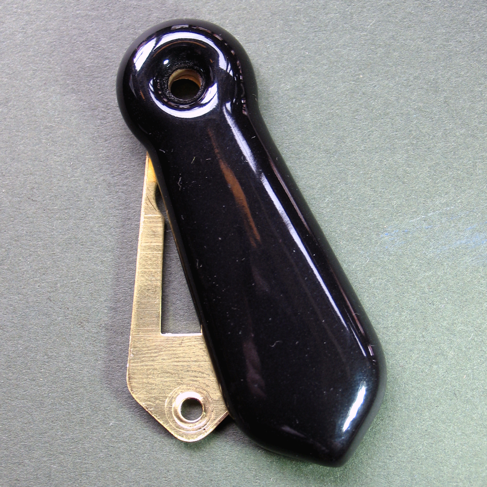 Ceramic escutcheon, black.