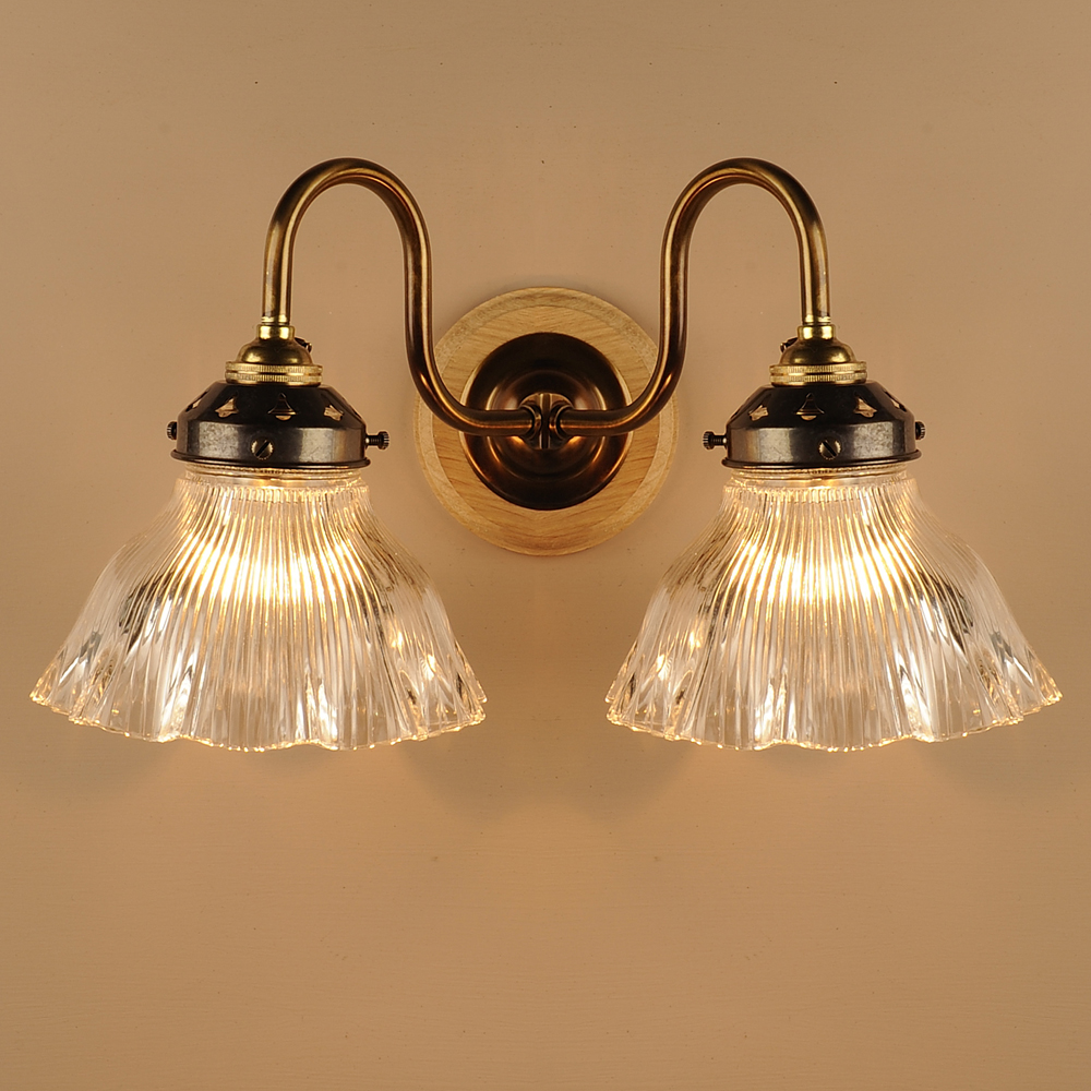 Double Prismatic Bell Wall Light in Antique Brass