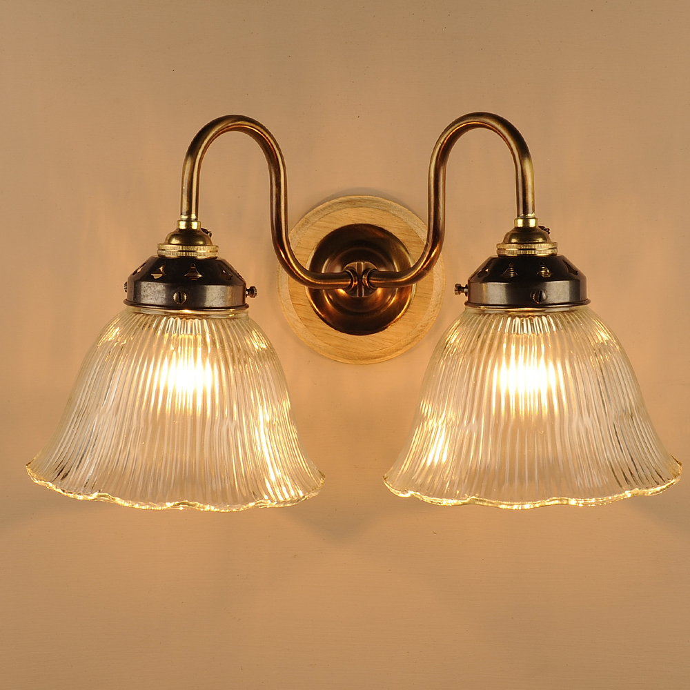 Double Prismatic Bell Wall Light in Antiqued Brass